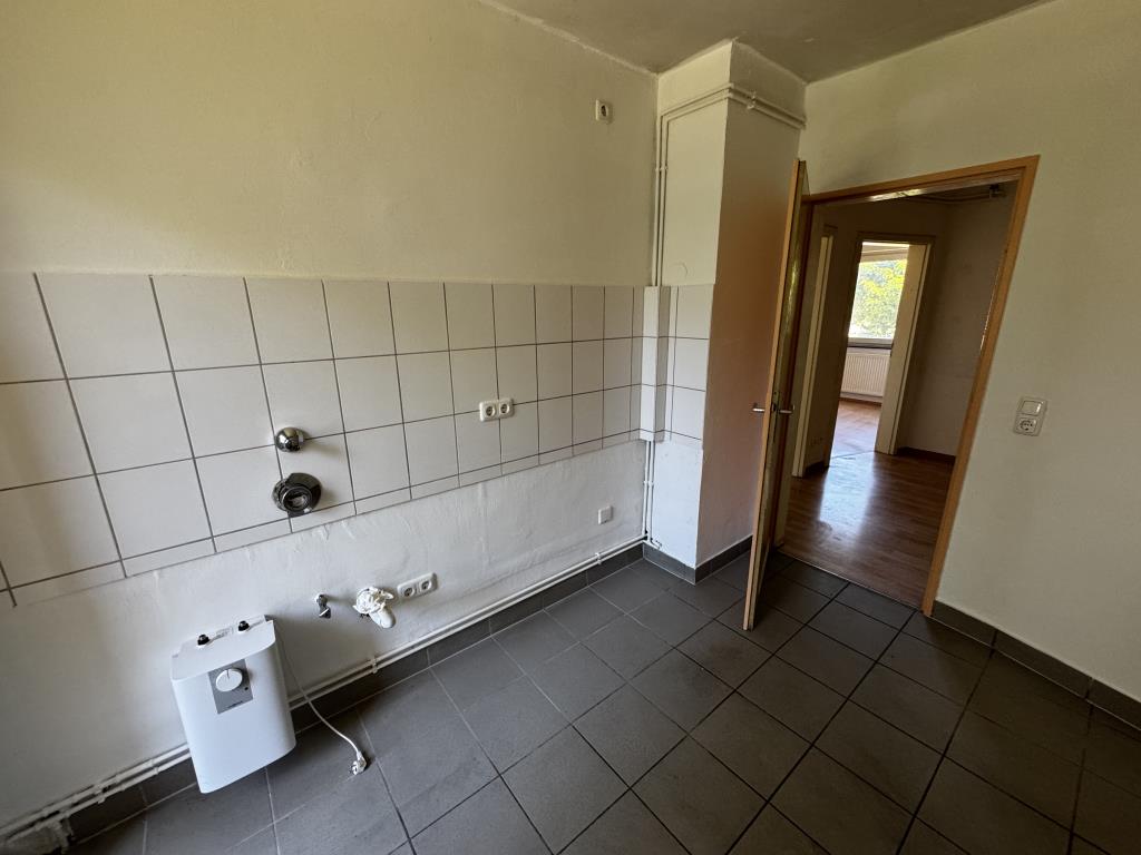 Praktisch geschnittene 2-Zimmer-Wohnung freut sich auf neue Mieter - Photo 4