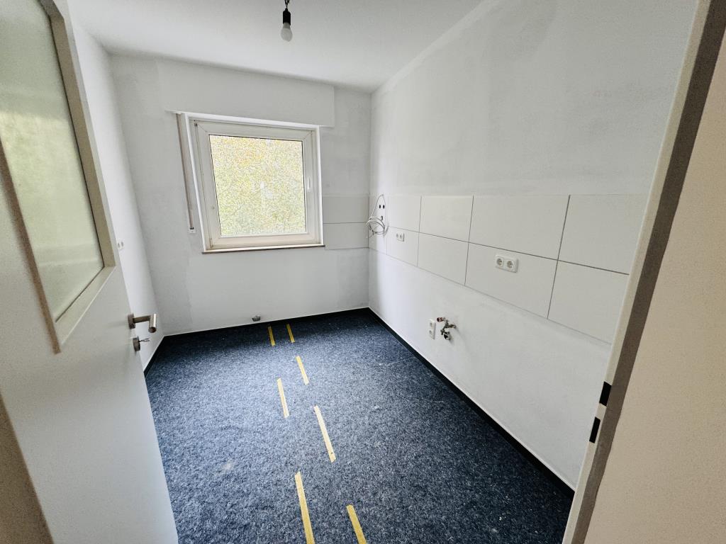 Über den Dächern zuhause: Modernisierte Wohnung mit Balkon im 5. Obergeschoss - Photo 3