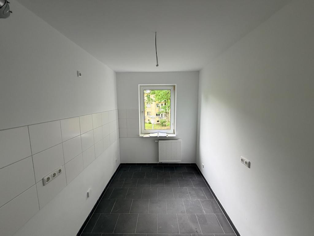 Zentral Wohnen - Modernisierte 3-Zimmer-Wohnung! - Foto 2
